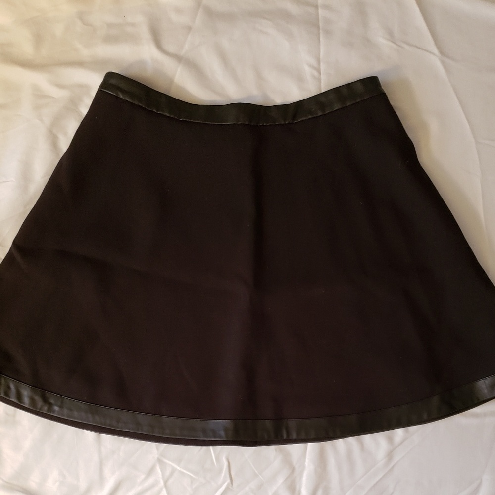 Black skirt with leather trim
